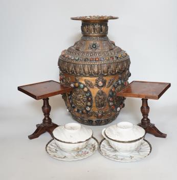 An early 20th century Tibetan hardstone mounted copper vase, Japanese porcelain cups and saucers and a pair of mahogany stands